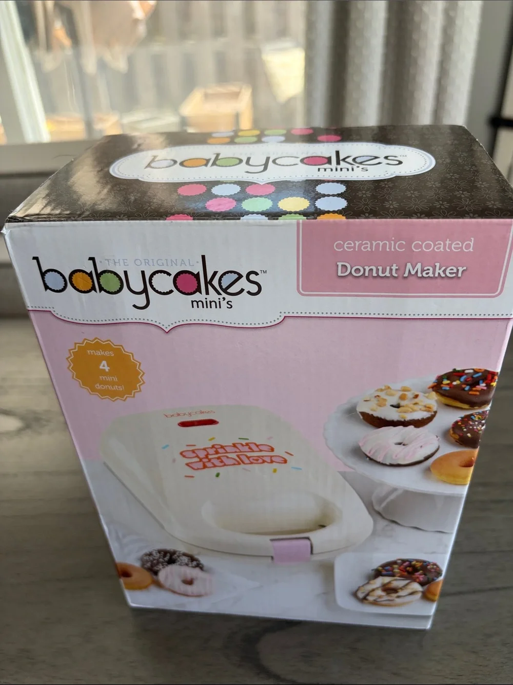 Babycakes Ceramic Coated Mini Donut Maker in Cream and Pink